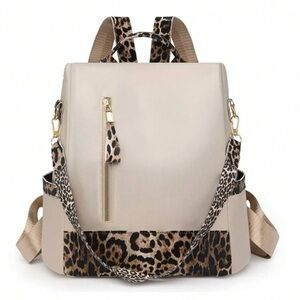 New beige and animal print backpack/purse